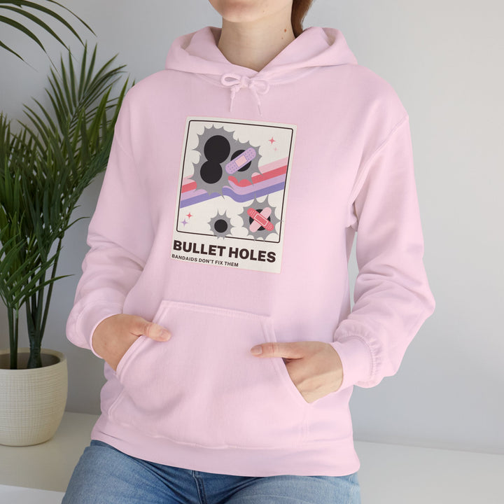 “Bullet Holes – Bandaids Don’t Fix Them” Unisex Heavy Blend™ Hooded Sweatshirt